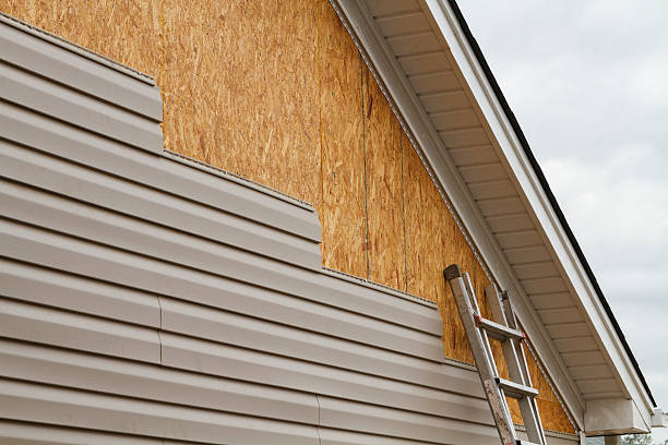 Professional Siding technician working in Baden, PA